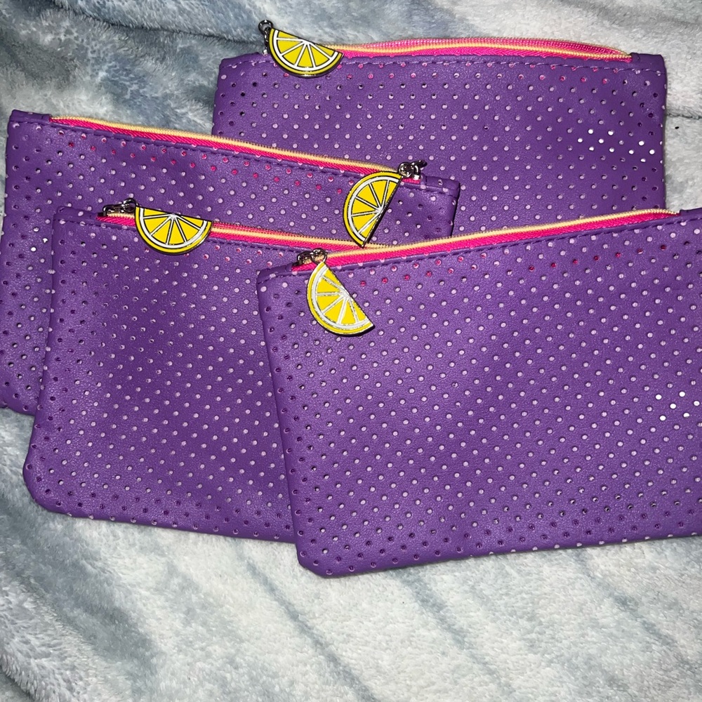 4 purple fruit ipsy bags